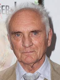 How tall is Terence Stamp?